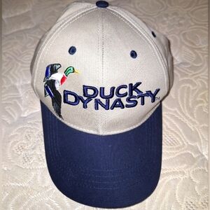 An A&E Duck Dynasty trucker hat with adjustable strap. EUC. Like new condition